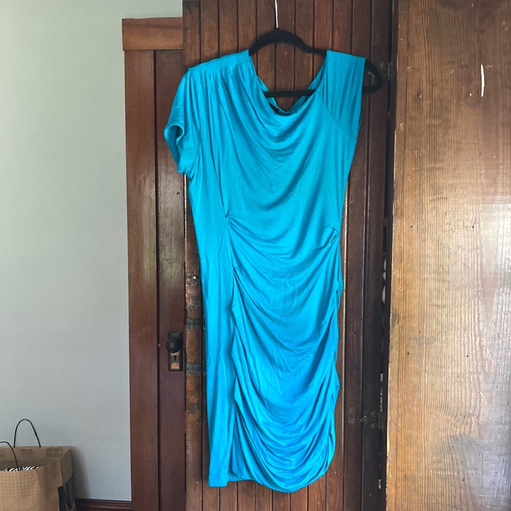Asymmetrical teal bebe dress